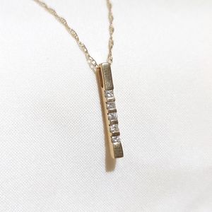 Solid 14k gold bar pendant with diamonds (?) on 14k gold dainty singapore chain